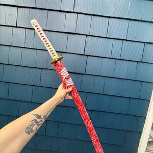 Red and White Decorative Sword